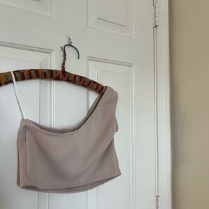 Light tan one shoulder ribbed crop top. Size L.